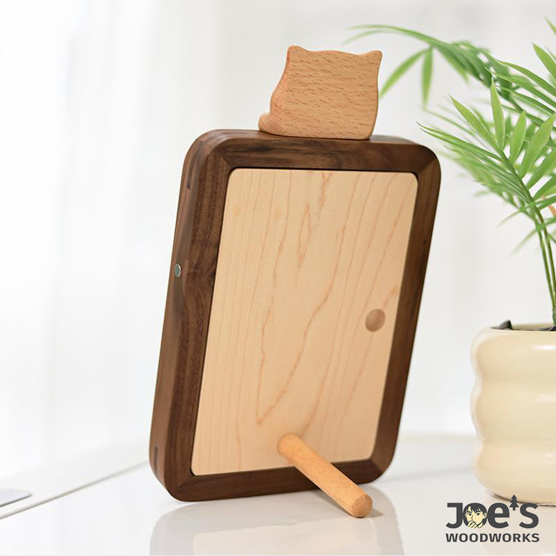 Back view showing wood stand and magnetic closure on cat photo frame.