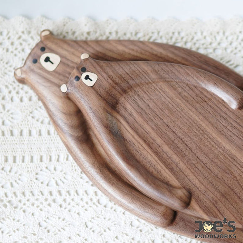 Pair of handmade walnut bear trays side-by-side