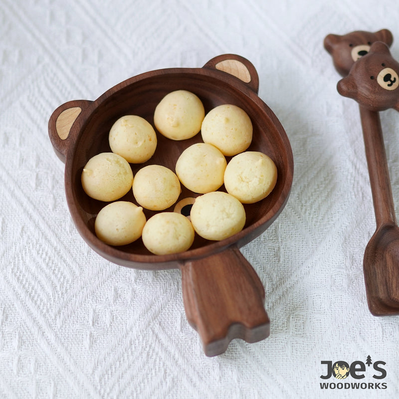 Bear-shaped wooden tray filled with snacks, ideal for children’s treats or desserts