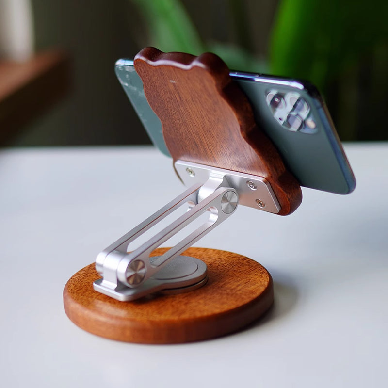 Bear wooden phone stand holding smartphone, perfect for desk setup