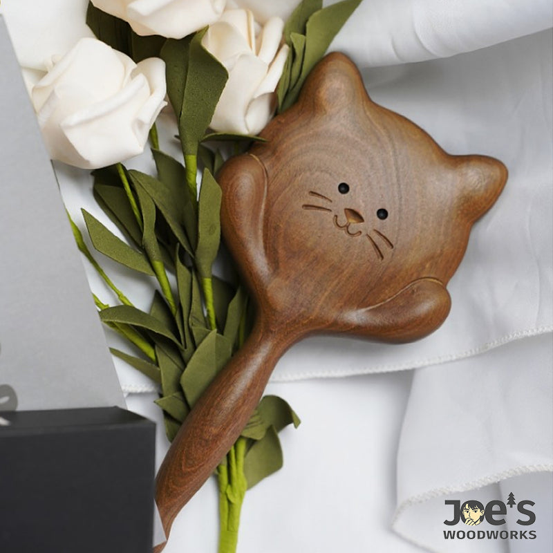 Cat-shaped wooden massage brush styled with flowers, perfect gift idea