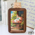 Wooden photo frame with sleepy cat topper, handcrafted by Joe’s Woodworks.