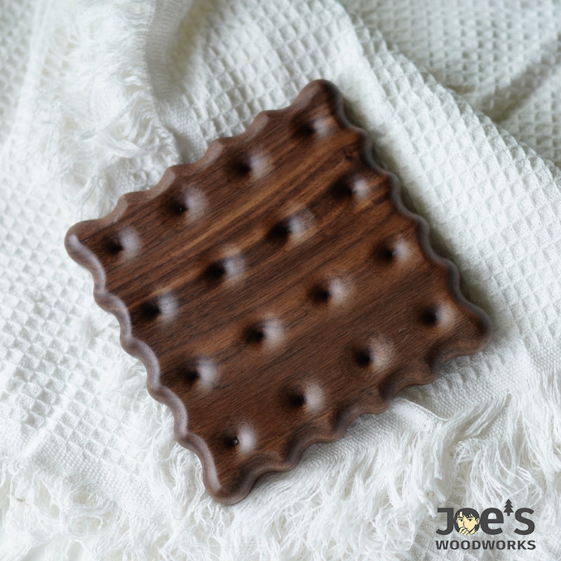 Square cookie-style walnut coaster with scalloped edge