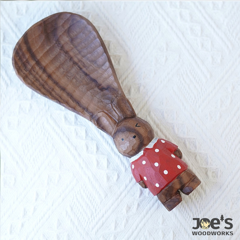 Cute bunny spoon with carved walnut wood ears, standing design, perfect for decor or use.