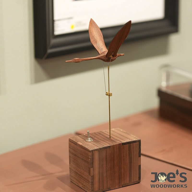 Wooden swan kinetic sculpture as elegant home decor