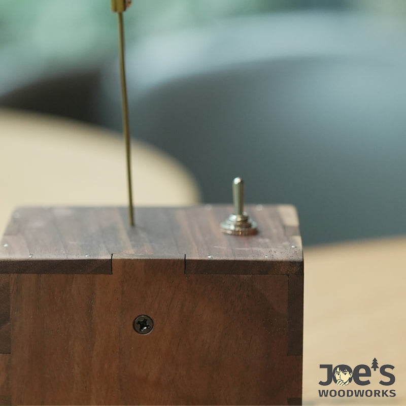 Walnut wood base with toggle switch of wooden automaton