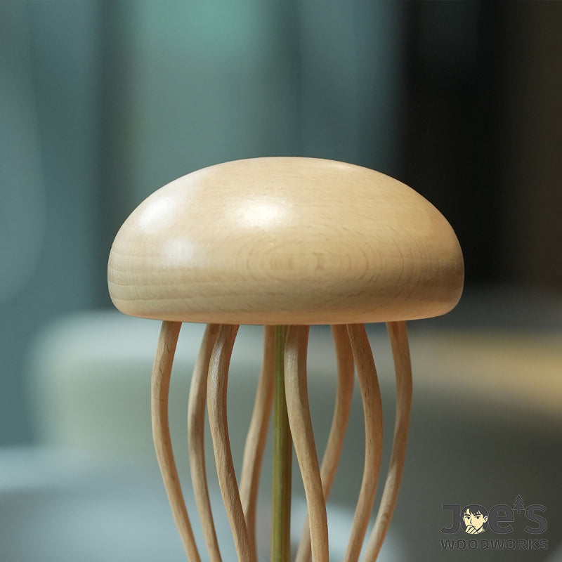 Smooth dome-shaped top of the natural wooden jellyfish sculpture
