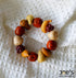 Joeswoodworks handcrafted fruit charm bracelet made from natural wood beads