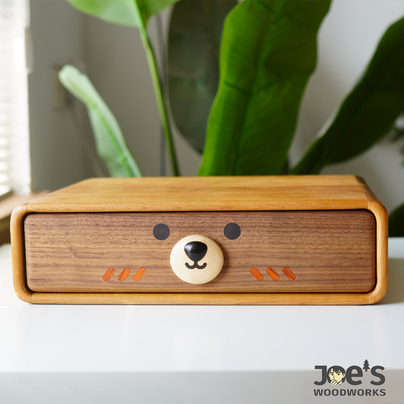Hand-carved bear face wooden drawer in compact cabinet design
