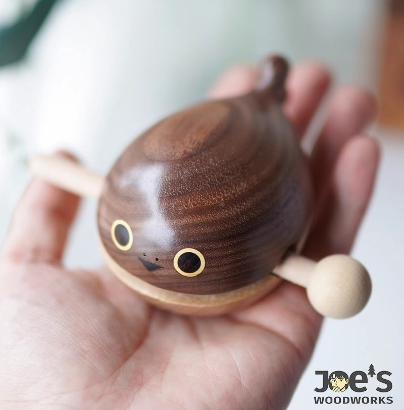 Mini Whale Wooden Knock Toy in hand – portable and playful percussion toy for kids or decor