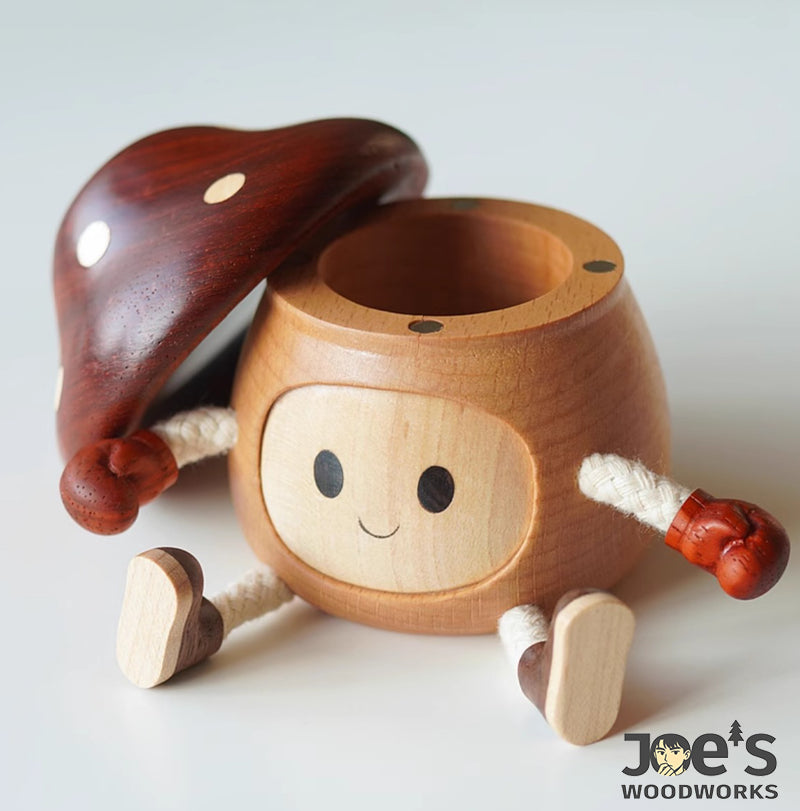 Mushroom wooden doll with removable cap showing hidden storage box