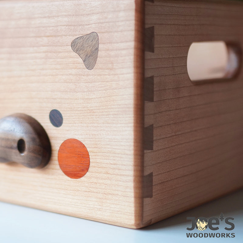 Side view showing dovetail joints and wood texture