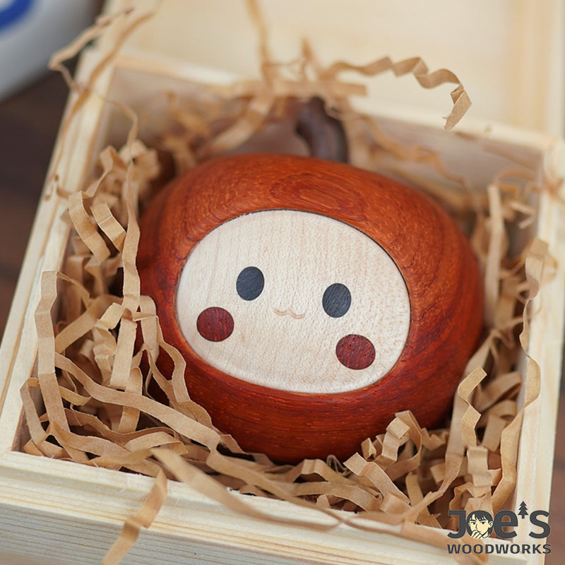 Wooden apple figurine appi placed in a gift box with shredded paper – ready for gifting - Pipimu