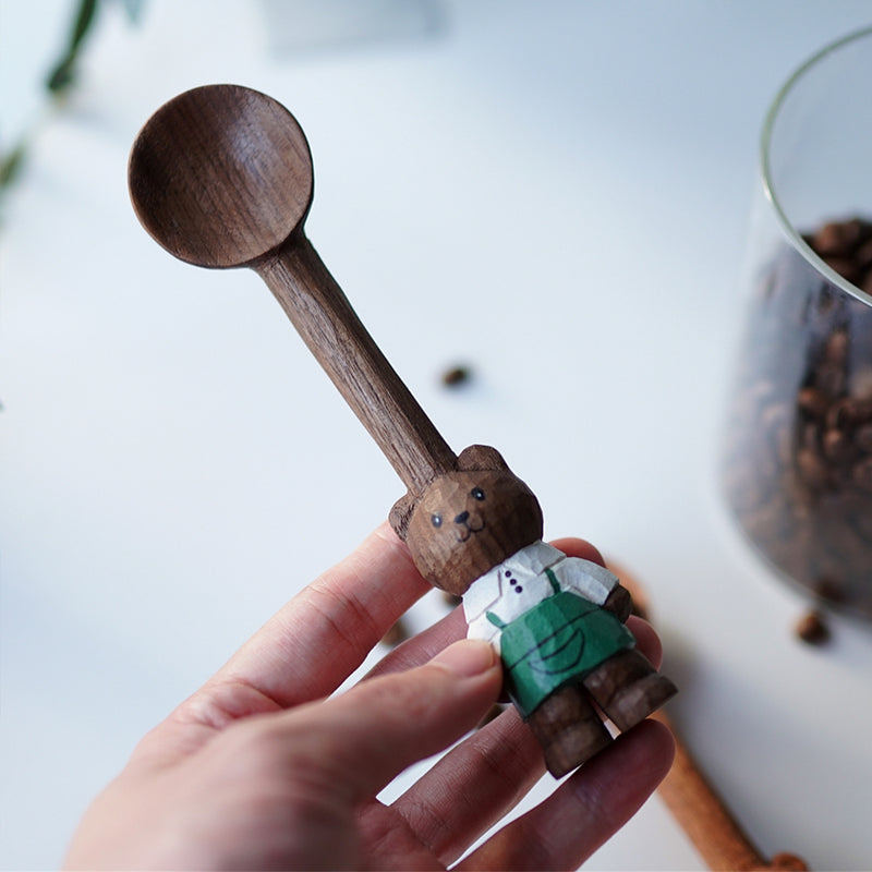 Hand holding Pipimu Barista Bear Coffee Scoop – artisanal wooden spoon