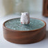 Pipimu Bear Jar with white bear figurine on walnut wood and glass lid