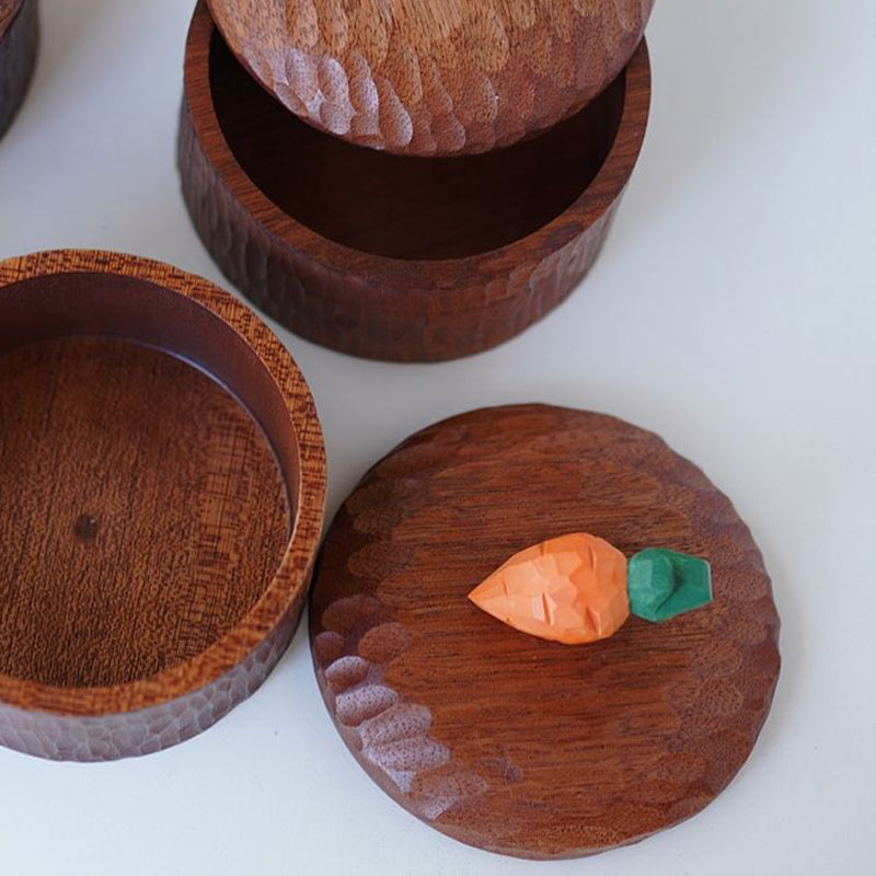 Multiple Pipimu carrot wooden storage boxes, handcrafted jars with unique wood grain