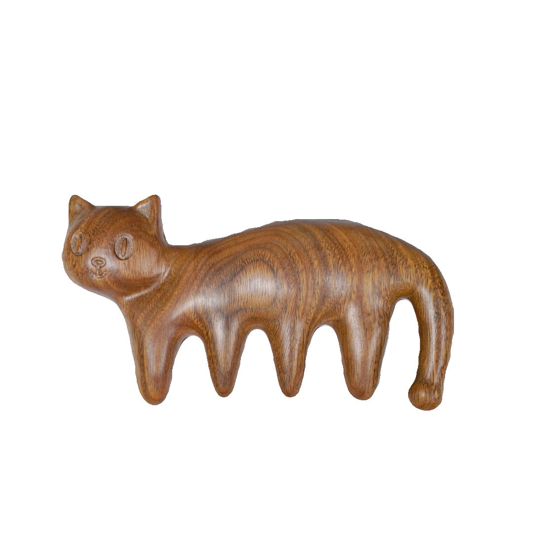 Cat Mimi green sandalwood massage comb on white background