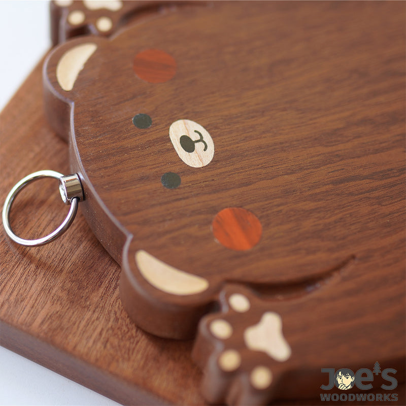 Close-up of Chopi Bear’s natural wood inlay with maple, rosewood, and ebony