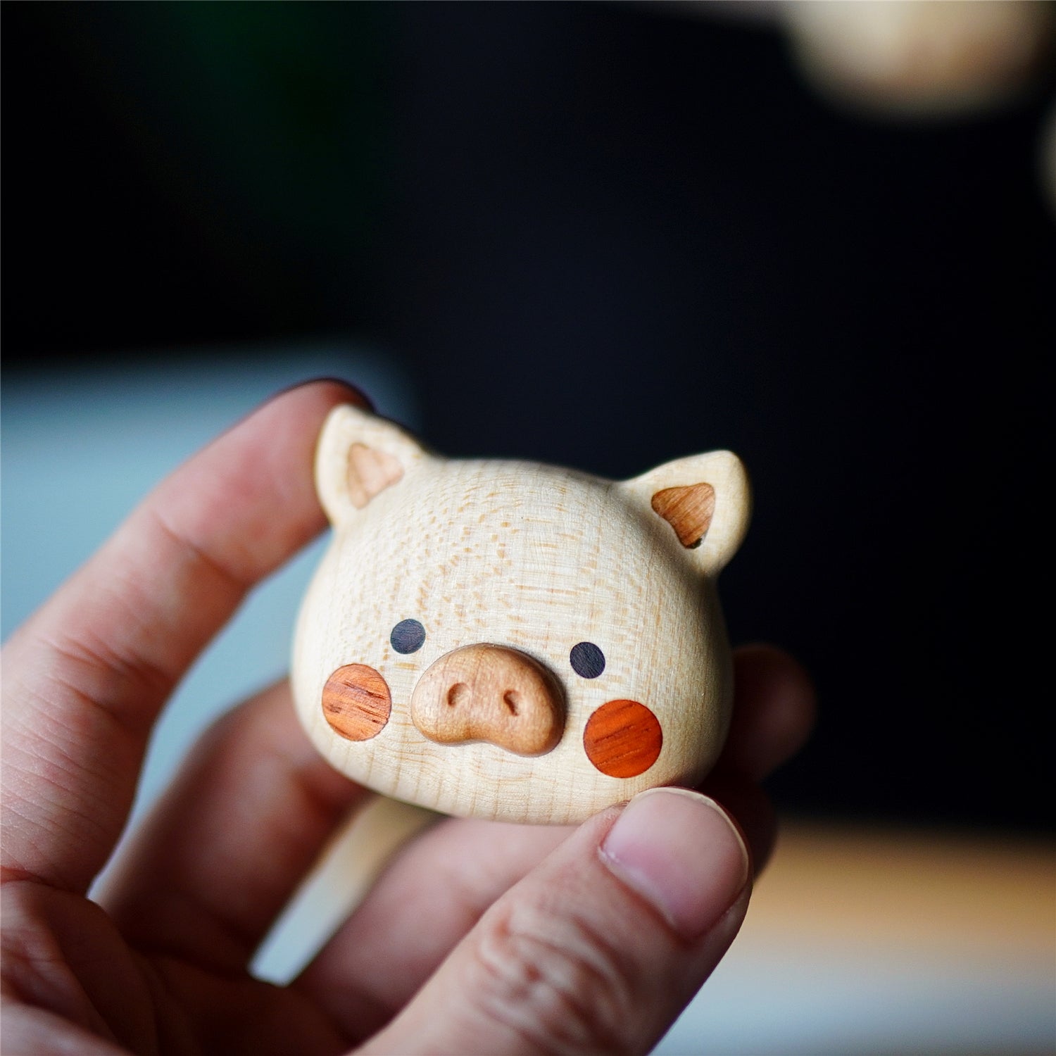 Pipimu Piggy Nunu fridge magnet hand-carved from maple and rosewood