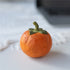 Main image: Pipimu Sunny Persimmon wood decor, hand-carved solid beech fruit ornament