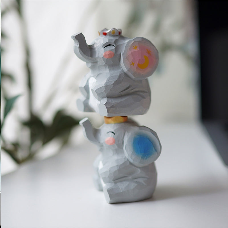 Side view of Pipimu Woodland Family Ella & Enzo wooden elephant figurines