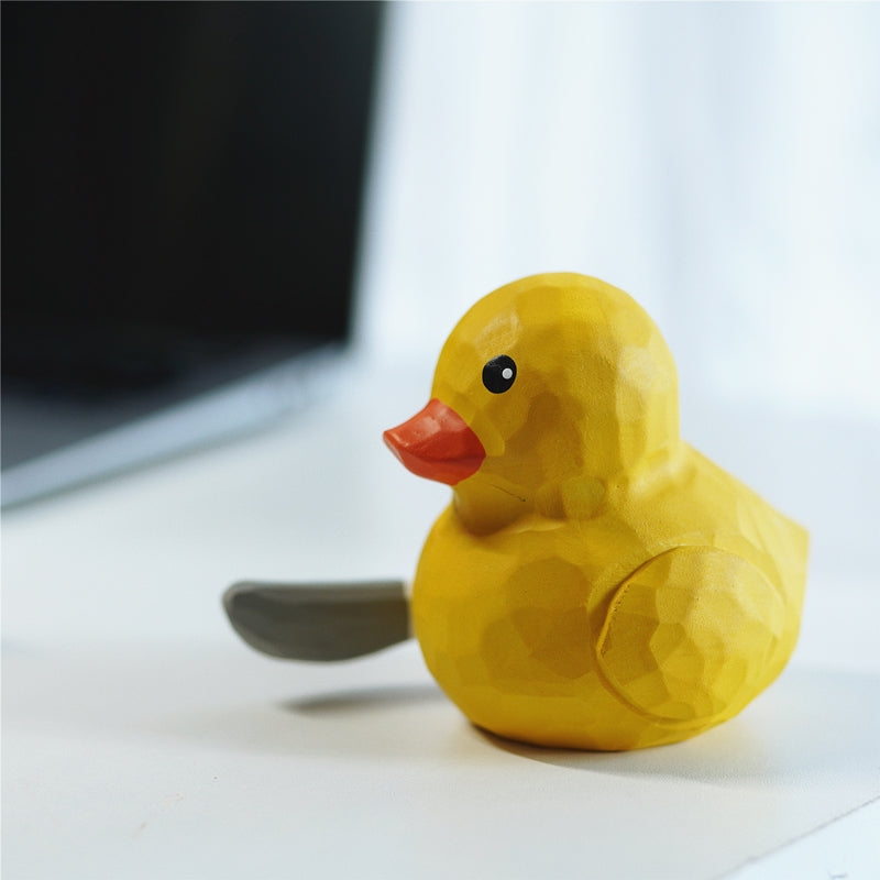 Cute duck figurine with knife for desk or car decor