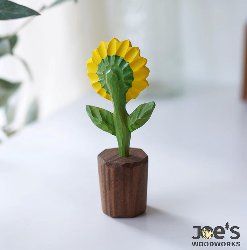 Back view of carved wooden sunflower showing leaf and petal texture
