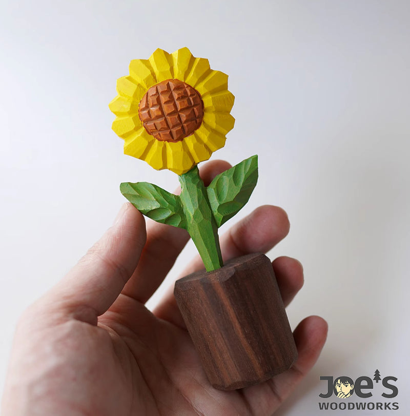 Close-up of SunnyBloom sunflower wood carving with realistic petal and leaf design