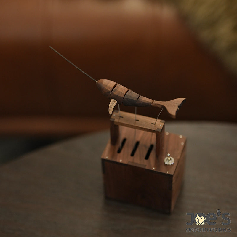 Artistic whale automaton placed near sofa for warm ambiance