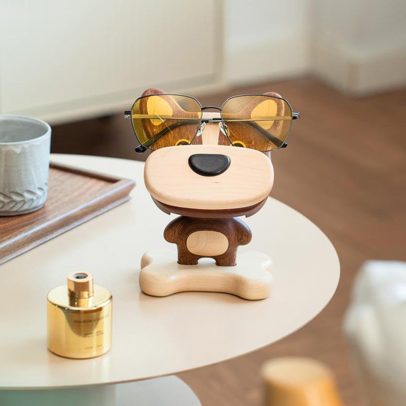 Close-up of wooden dog phone stand showing fine wood grain