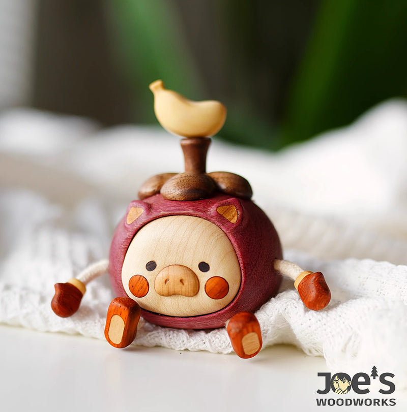 Cute wooden pig desk ornament in fruit costume with banana top, handmade figurine by Joe&