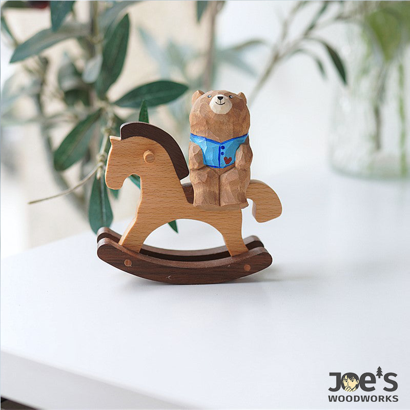 Adorable bear riding a wooden rocking horse, handcrafted toy-style ornament for desk or shelf