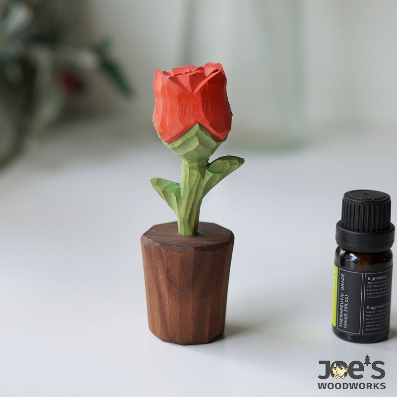 Carved wooden rose diffuser with essential oil, natural aroma decoration