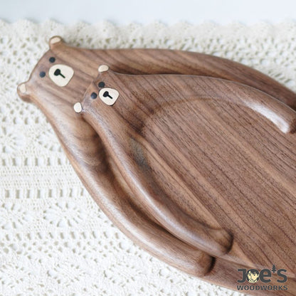 Pair of handmade walnut bear trays side-by-side