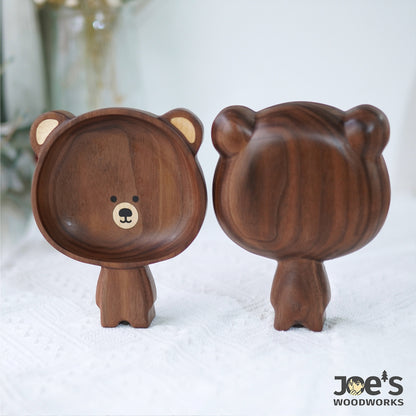 Front and back view of the bear-shaped walnut tray, highlighting its smooth finish