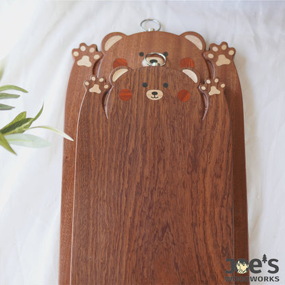 Layered view of cartoon bear cutting boards