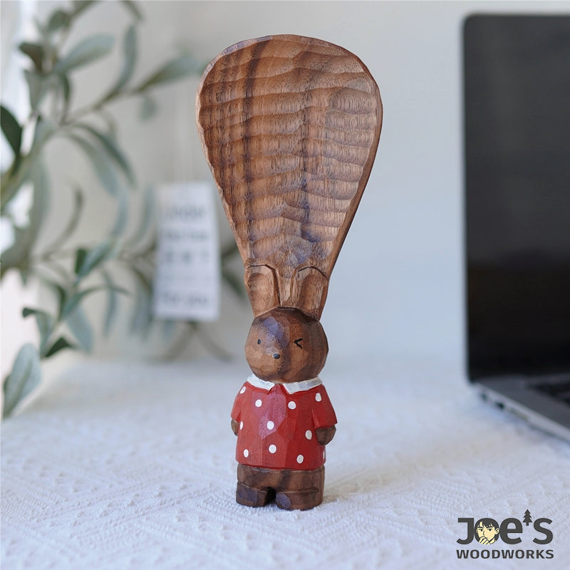 Bunny-shaped wooden rice scoop with polka dot dress, cute standing bunny design, handmade by Joe’s Woodworks.