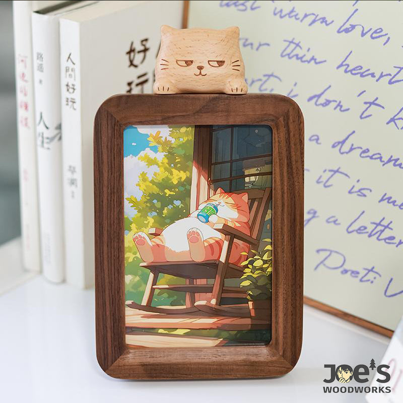 Wooden photo frame with sleepy cat topper, handcrafted by Joe’s Woodworks.