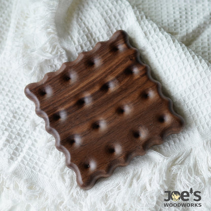 Square cookie-style walnut coaster with scalloped edge