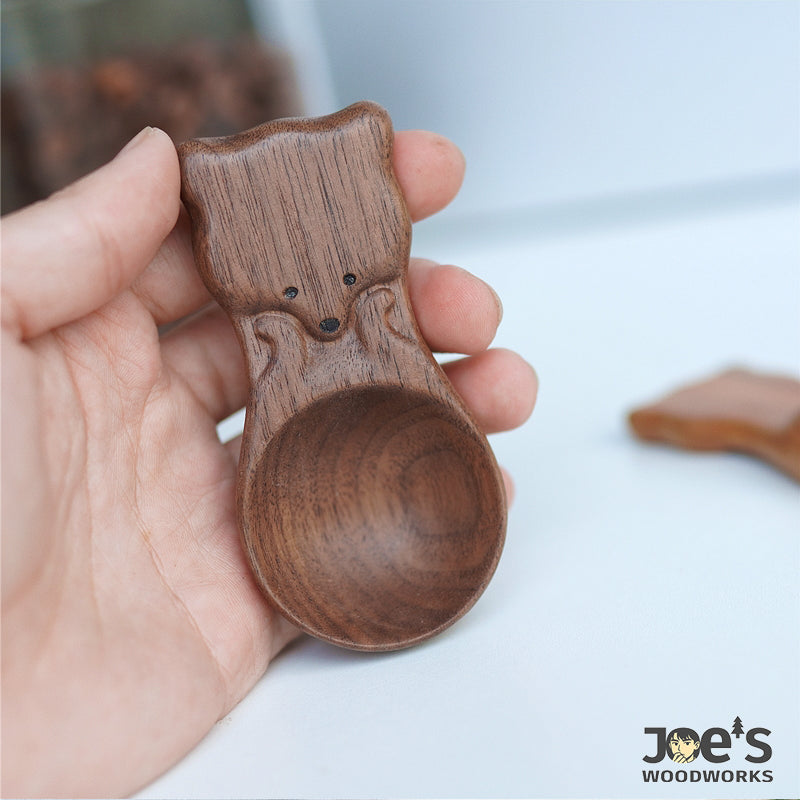 Handcrafted fox-shaped scoop made of dark walnut wood with cute engraved details