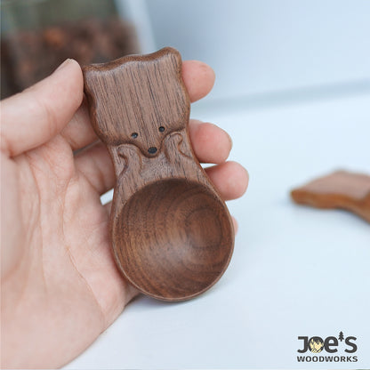 Handcrafted fox-shaped scoop made of dark walnut wood with cute engraved details