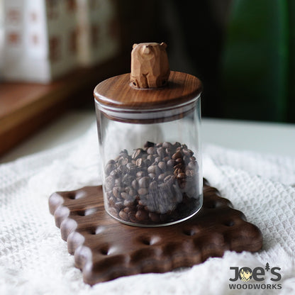 Glass jar on wooden cookie coaster – product usage example