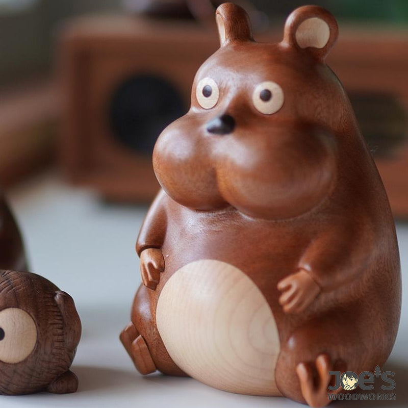 Large mouse figurine with natural woodgrain finish and comical expression.