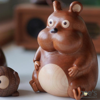 Large mouse figurine with natural woodgrain finish and comical expression.