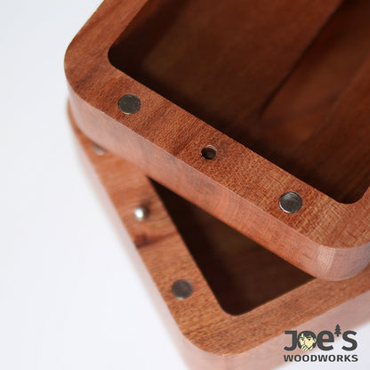 Close-up of magnetic closure mechanism inside wooden bear tissue holder