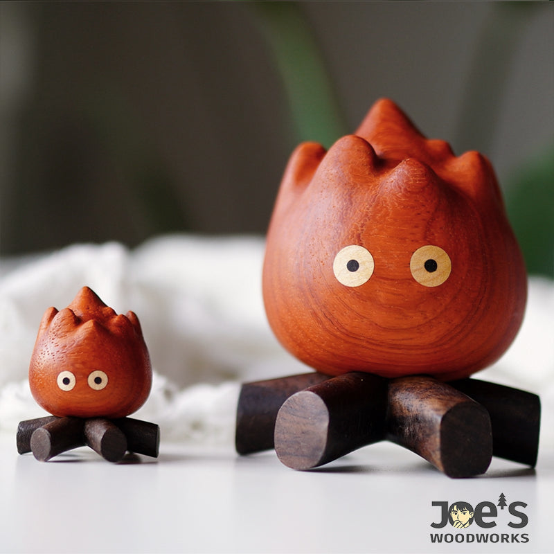 Two sizes of fire flame figurines side-by-side, showcasing their adorable design