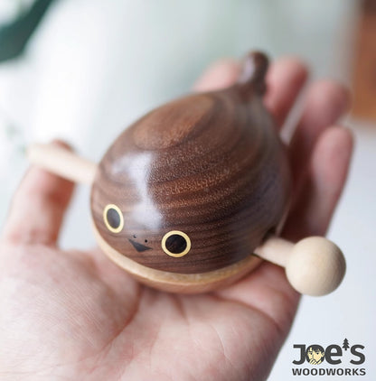 Mini Whale Wooden Knock Toy in hand – portable and playful percussion toy for kids or decor
