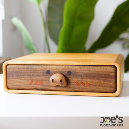 Pig face wooden drawer featured in playful mini cabinet for storage