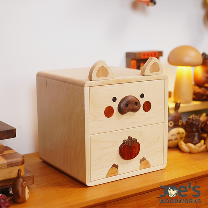 Side angle view of the piggy wooden mini storage cabinet