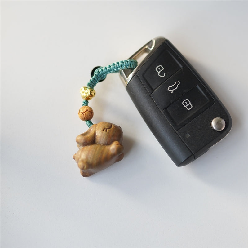 Close-up of Pipimu Bunny Dash handcrafted wooden rabbit charm